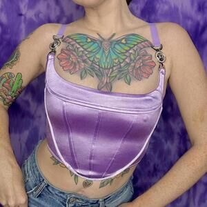 Edikted NWT Purple corset top with adjustable straps and zip back fastening.